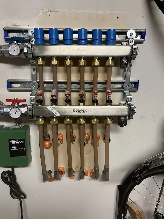 Plumber performing Water Heater Repair at a residential property in South Valley